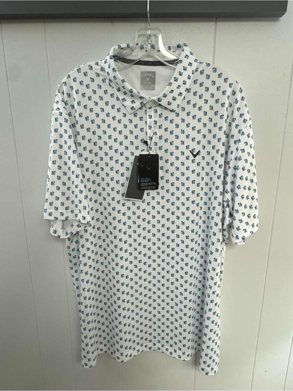 Callaway Opti-Dri Golf Polo Shirt featuring an all-over tropical cocktail print.